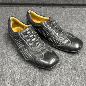 Sandro Moscoloni Black Leather Loafers with Polished Finish